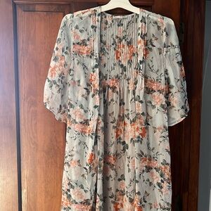 Sheer flora printed thigh length cardigan